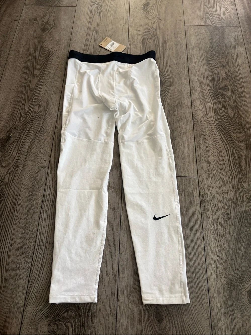 Nike White Kids' Athletic Leggings with Black Waistband and Swoosh